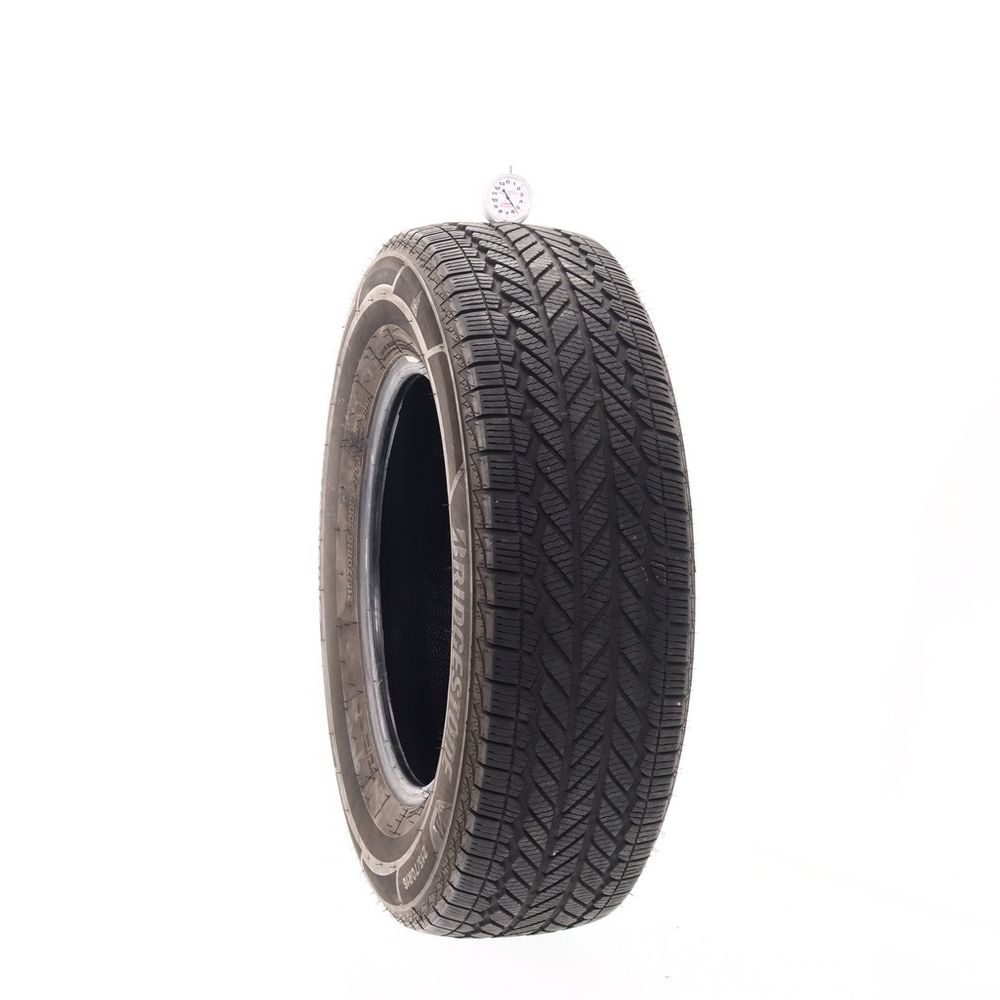Used 215/70R16 Bridgestone WeatherPeak 100H - 5.5/32 - Image 1