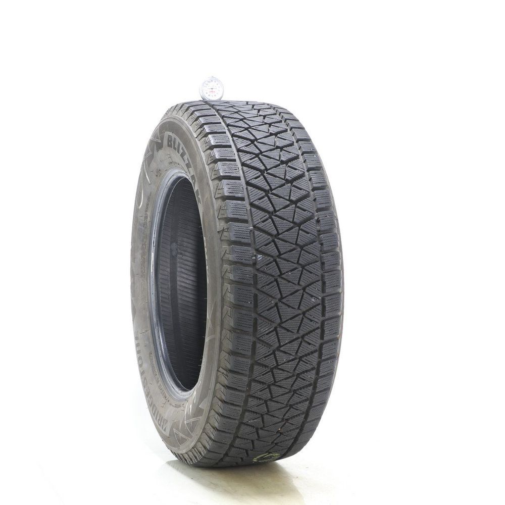 Set of (2) Used 245/65R17 Bridgestone Blizzak DM-V2 107S - 10-11/32 - Image 1