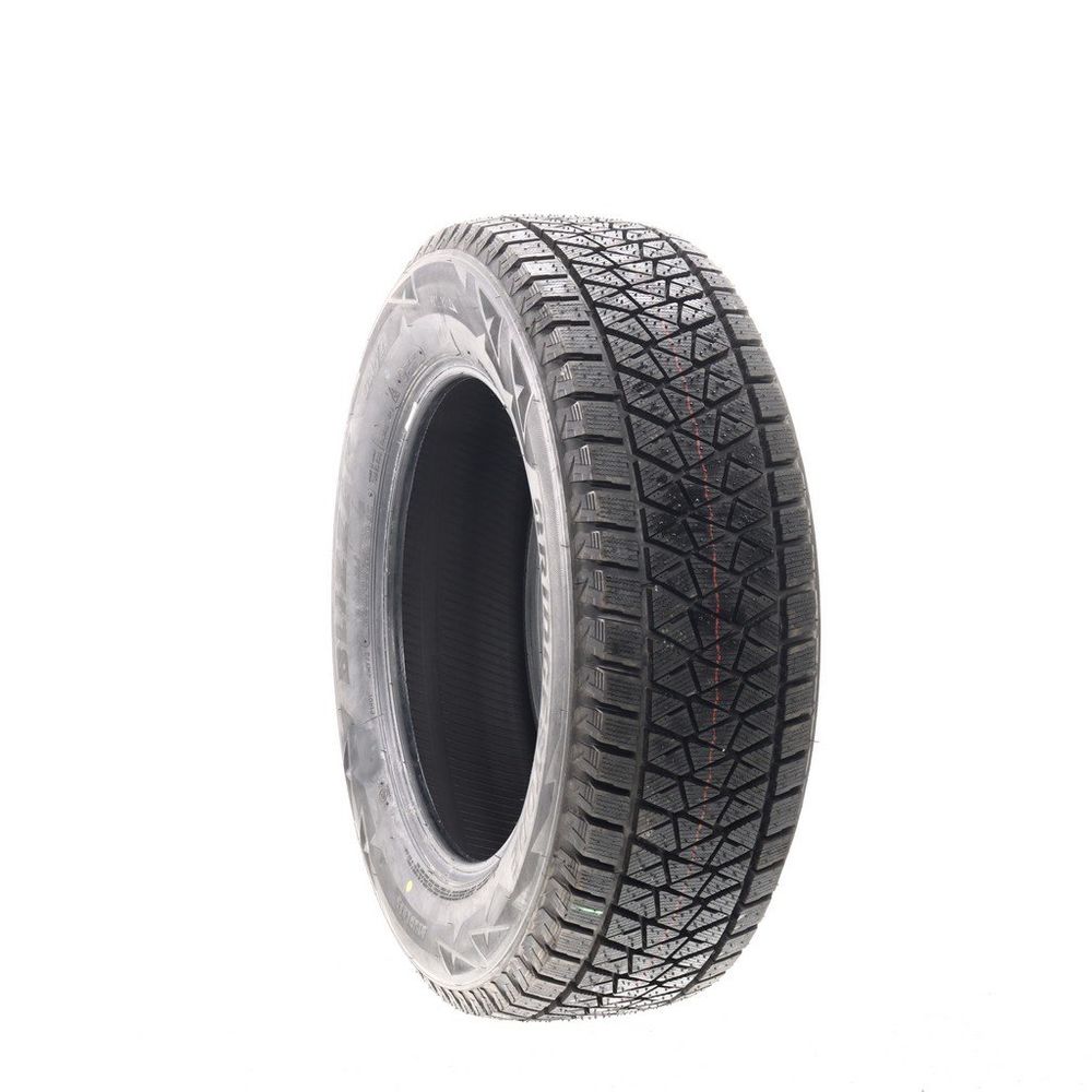 Set of (2) New 235/65R18 Bridgestone Blizzak DM-V2 106S - 13/32 - Image 1