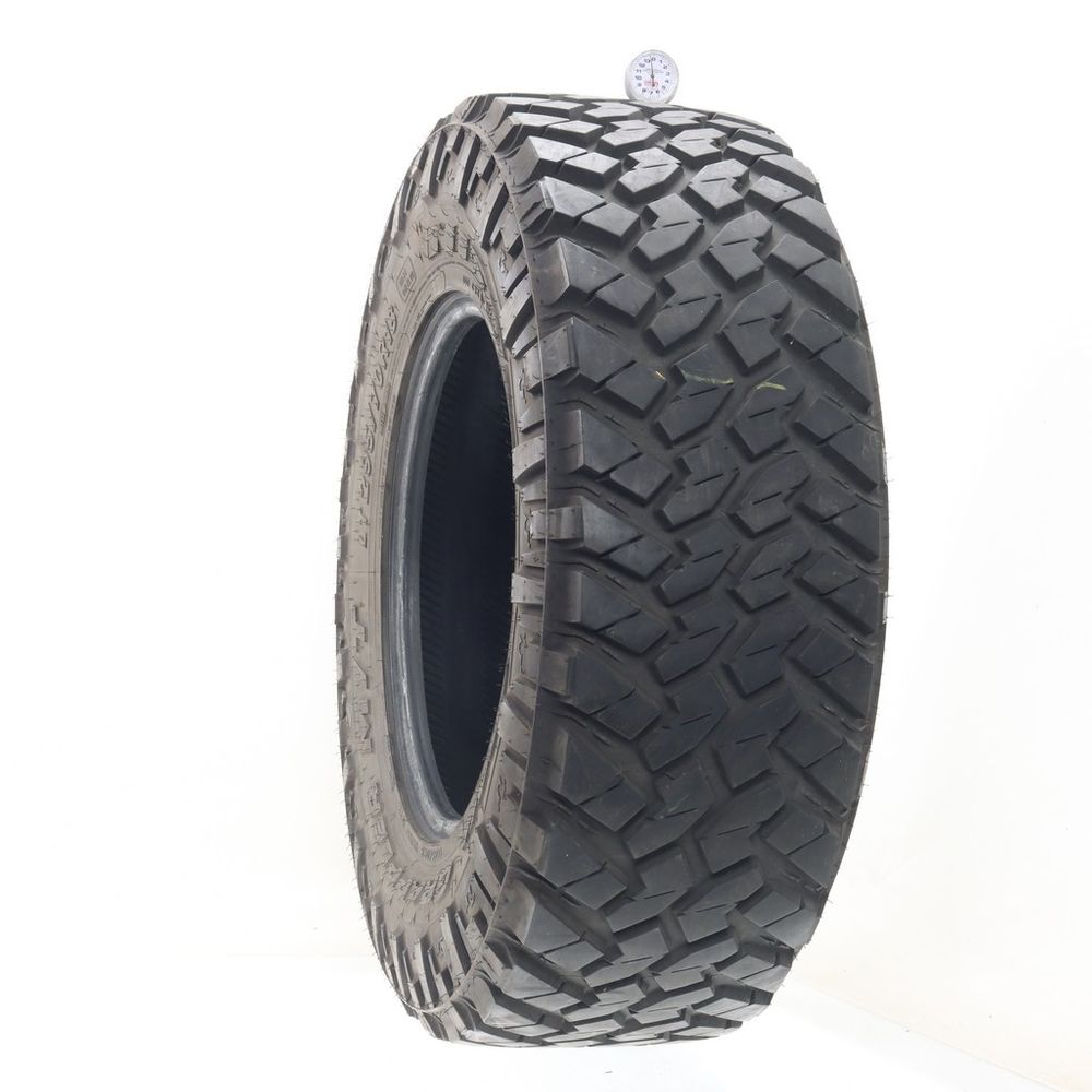 Used LT 295/70R18 Nitto Trail Grappler M/T 129/126Q E - 13.5/32 - Image 1