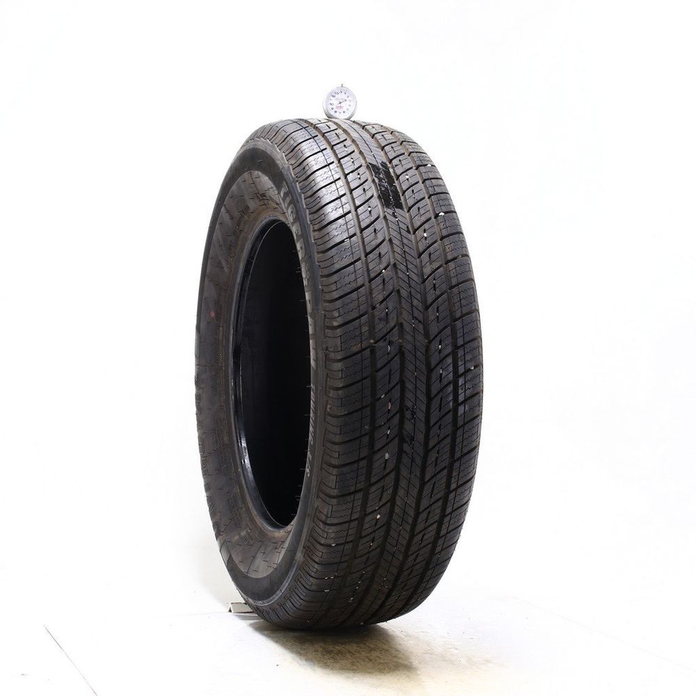 Used 235/65R18 Uniroyal Tiger Paw Touring A/S 106V - 9.5/32 - Image 1