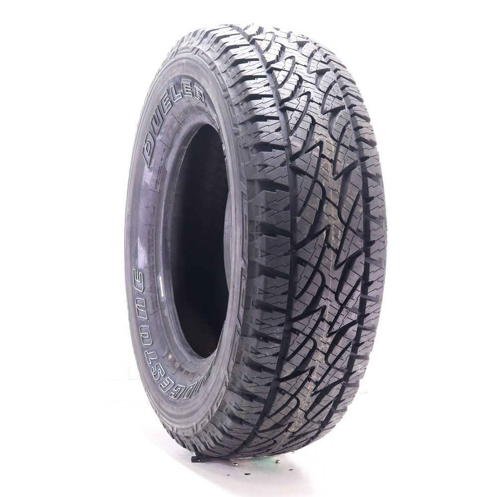 Driven Once LT 265/70R17 Bridgestone Dueler A/T REVO 2 121/118S - 15/32 - Image 1