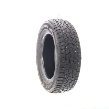 Set of (2) Used 235/65R18 Cooper Evolution Winter Studded 106T - 10/32