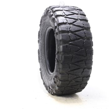 Used LT35X12.5R17 Nitto Extreme Terrain Mud Grappler 125P - 12/32