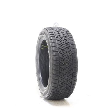 Set of (4) Used 235/55R18 Bridgestone Blizzak DM-V2 100T - 8/32